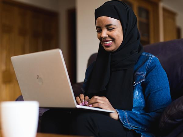 Student at home on laptop